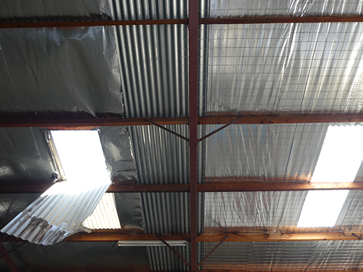 Broken poly sheeting following a fall of a worker