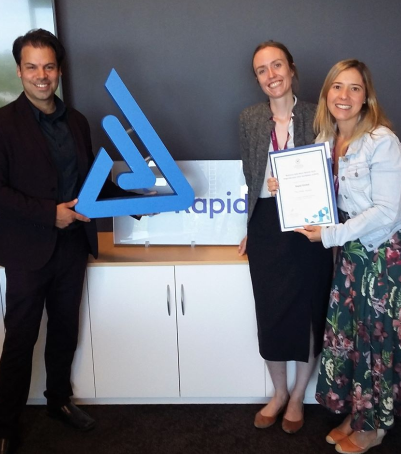 Rapid Global staff with their winner's certificate