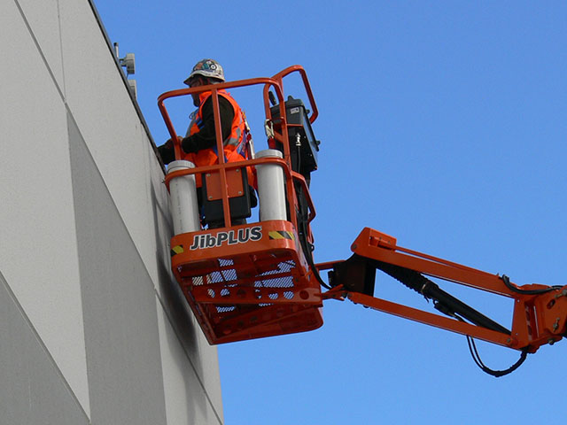 Worker on a elevating work platform with no overhead dangers
